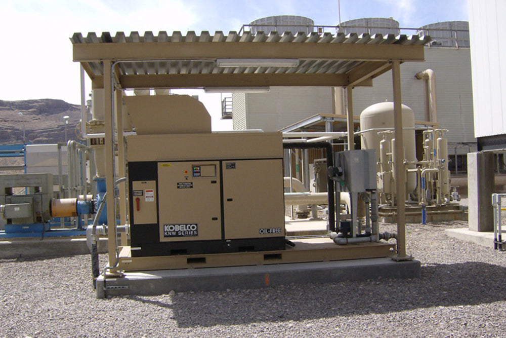 Rogers Machinery Company provides a custom, outdoor Rogers KNW oil-free rotary screw air compressor skid for the power generation industry
