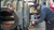Rogers-machinery-service-man-repairing-compressed-air-blower-at-cooperate-headquarters-in-portland-oregon